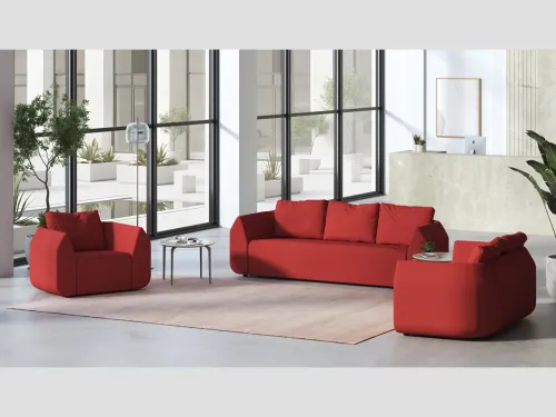 Ark kırmızı koltuk ve kanepe grubu, kavisli ve sarıcı formuyla modern lobi, resepsiyon ve ofis lounge alanlarında güçlü bir karşılama etkisi oluşturur.