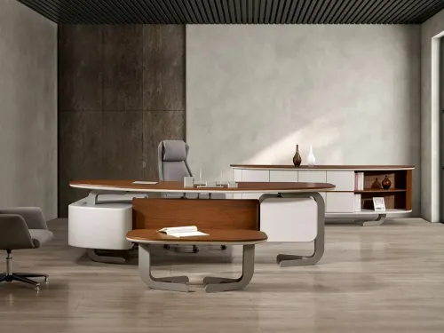 DORA VIP ceviz makam masası tam seti, oval form ve metal ayaklarıyla hafif geometrili modern çalışma masası ve premium modern vip makam takımı olarak liderlik ritmini yansıtır.
