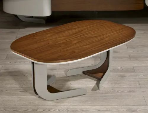 DORA VIP ceviz oval sehpa, zarif hatlı makam takımı dora serisi ve modern minimal ofis masası ceviz ile set bütünlüğünü tamamlayan premium bir aksesuardır.
