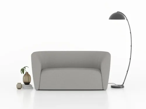 Fin gri ikili kanepe, yumuşak hatları ve sade formuyla modern ofis bekleme alanlarında sakin bir karşılama etkisi oluşturur.