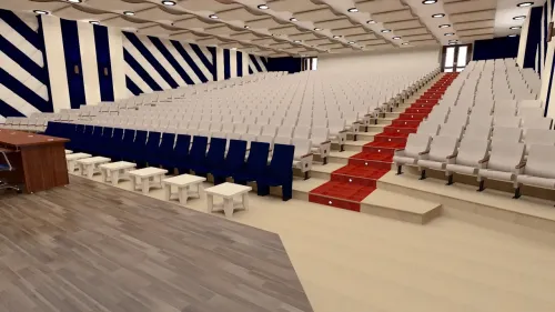 Gençlik Spor İl Müdürlüğü projesinde geniş konferans salonu, sıralı oturma düzeni ve sahne aksıyla kurumsal etkinlikler için düzenli bir alan sunar.