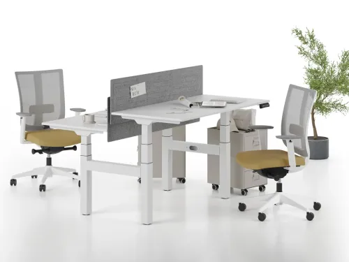 SET ikili çalışma masası, yükseklik ayarlı ayak sistemi ve panel bölücülü yapısıyla modern ofislerde aktif ve esnek kullanım sunar.
