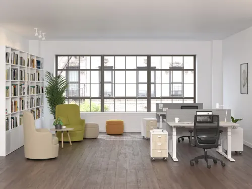 Açık ofis ortamında kullanılan SET Home masalar, keçe paneller ve portatif depolama çözümleriyle hareketli çalışma düzeni için sade bir atmosfer sunar.